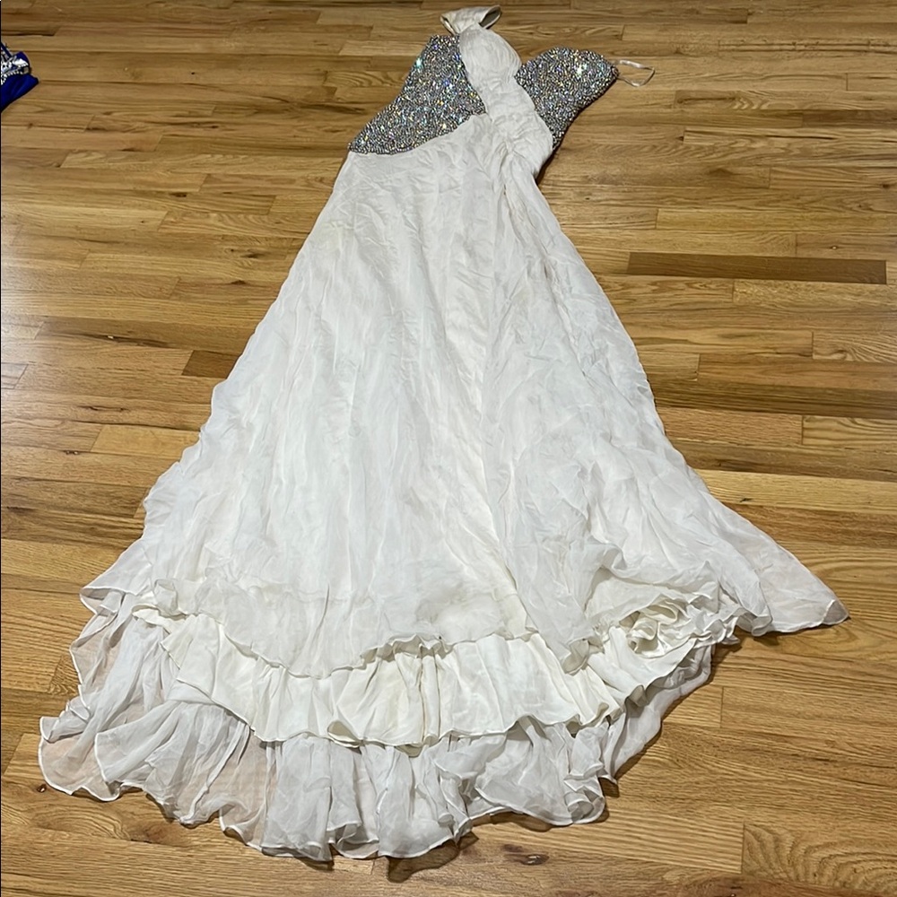 White One Shoulder Ruffled Gown